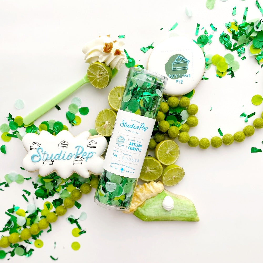 Green confetti artisan confetti tube with key lime pie cookies and limes dessert theme from Parte Haus party supply store in Bethesda MD
