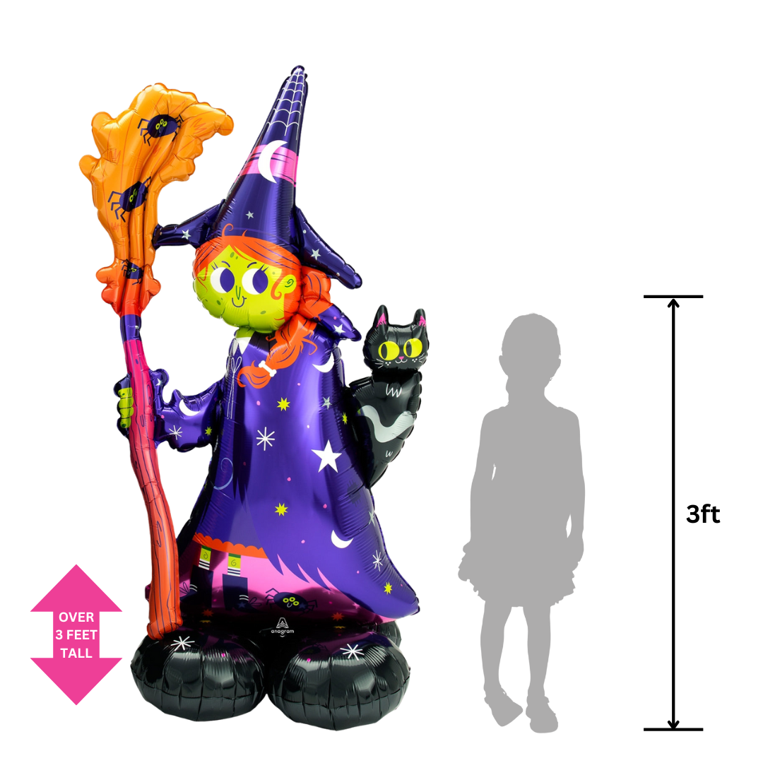 Purple and green witch foil balloon with broom and cat Halloween decoration from Parte Haus party supply store in Bethesda MD