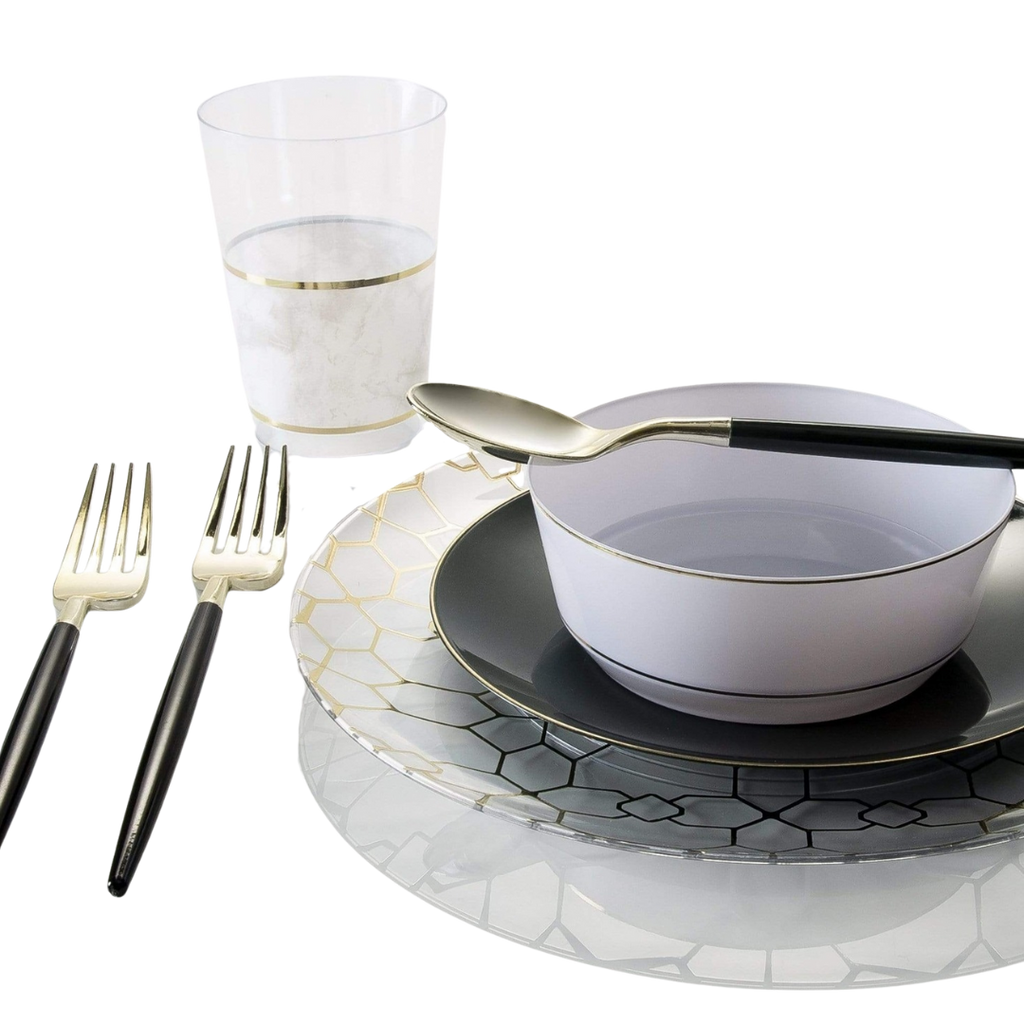 Gold and white elegant dinnerware set with forks plates bowl and cup for celebration from Parte Haus party supply store in Bethesda MD.