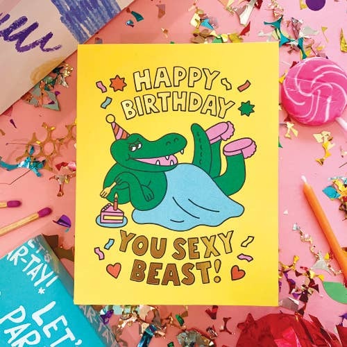 Yellow funny crocodile birthday card with confetti for birthday from Parte Haus party supply store in Bethesda MD