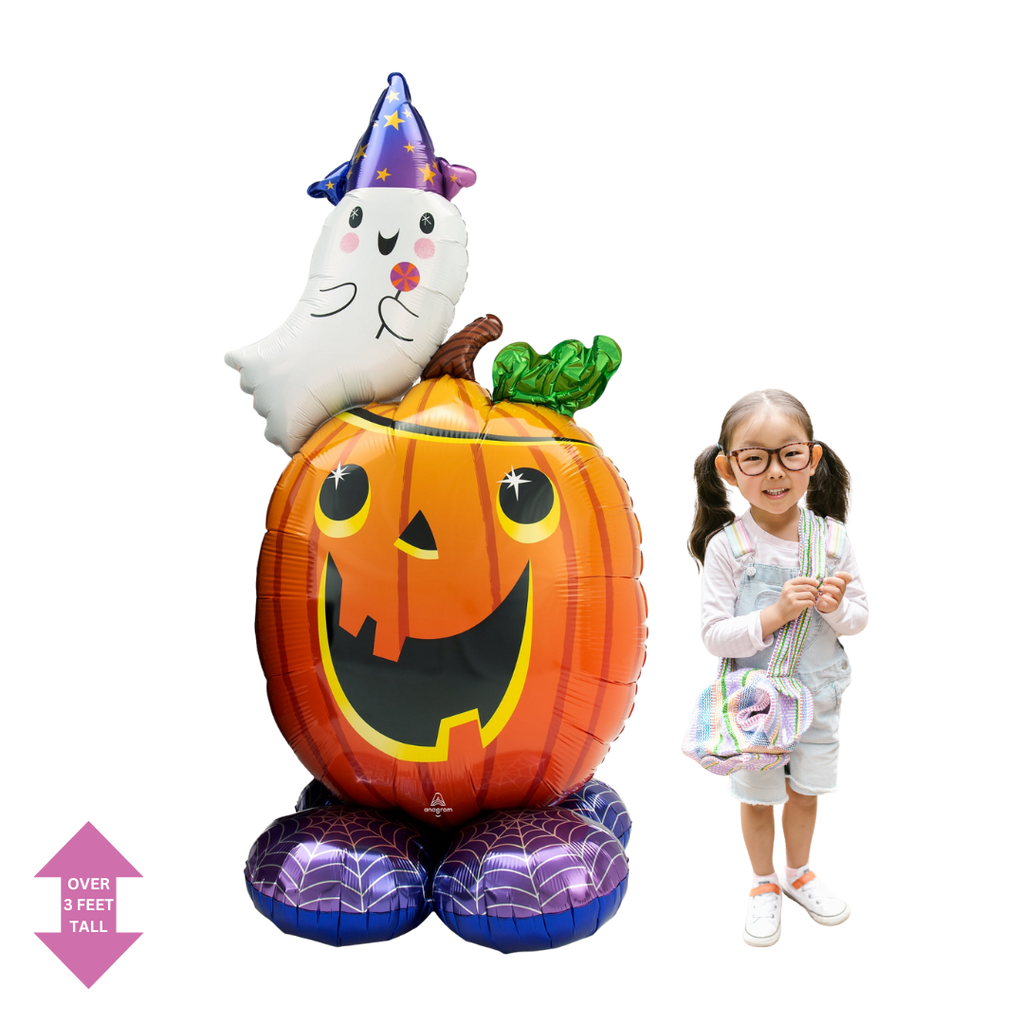 Orange pumpkin and white ghost foil Halloween balloon with a child from Parte Haus party supply store in Bethesda Maryland