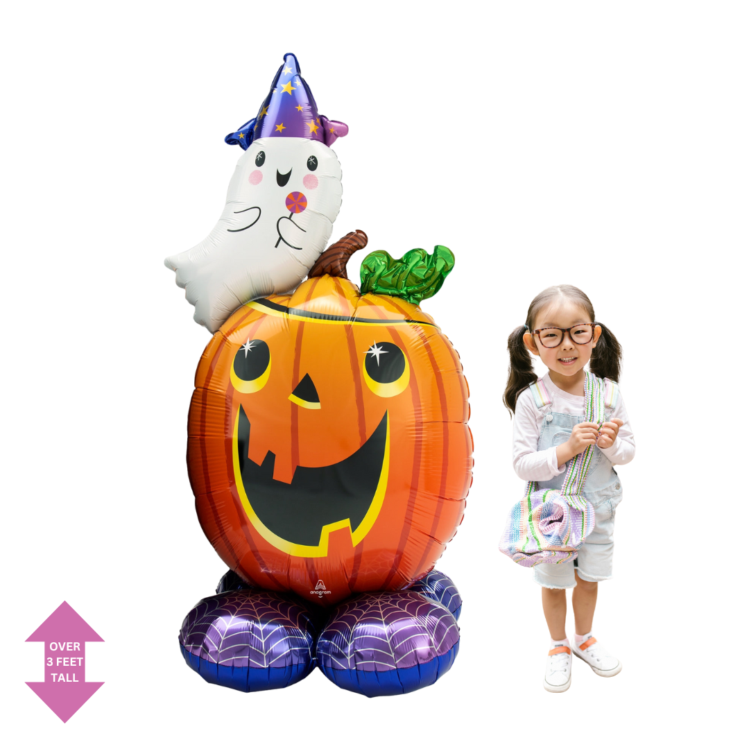 Orange pumpkin and white ghost foil Halloween balloon with a child from Parte Haus party supply store in Bethesda Maryland