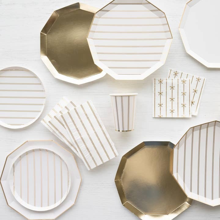 Gold and white disposable tableware set with stripes for birthdays from Parte Haus party supply store in Bethesda MD