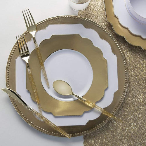 Gold and white dinnerware set with glitter cutlery elegant table setting for celebrations from Parte Haus party supply store in Bethesda Maryland