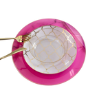 Pink and gold place setting with patterned plates and gold utensils birthday decor from Parte Haus party supply store in Bethesda MD
