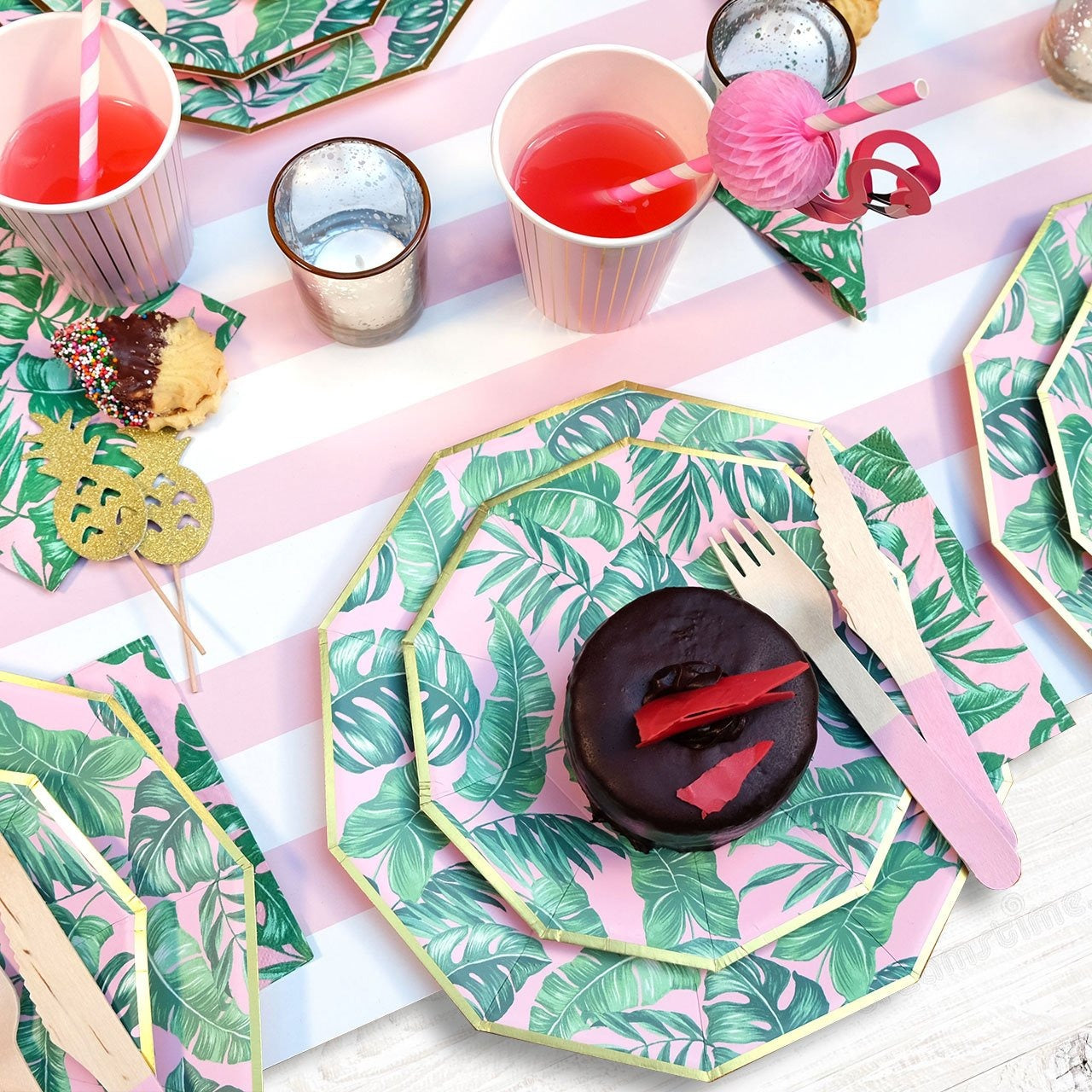 Pink and green tropical leaf plates with dessert and drink summer party theme from Parte Haus party supply store in Bethesda MD