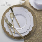 Gold and white dinnerware set with matching cutlery elegant table setting from Parte Haus party supply store in Bethesda Maryland