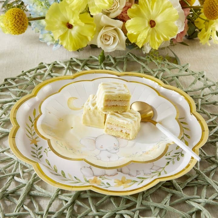 Yellow scalloped baby shower plate with cute elephant from Parte Haus party supply store in Bethesda MD