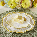 Yellow scalloped baby shower plate with cute elephant from Parte Haus party supply store in Bethesda MD