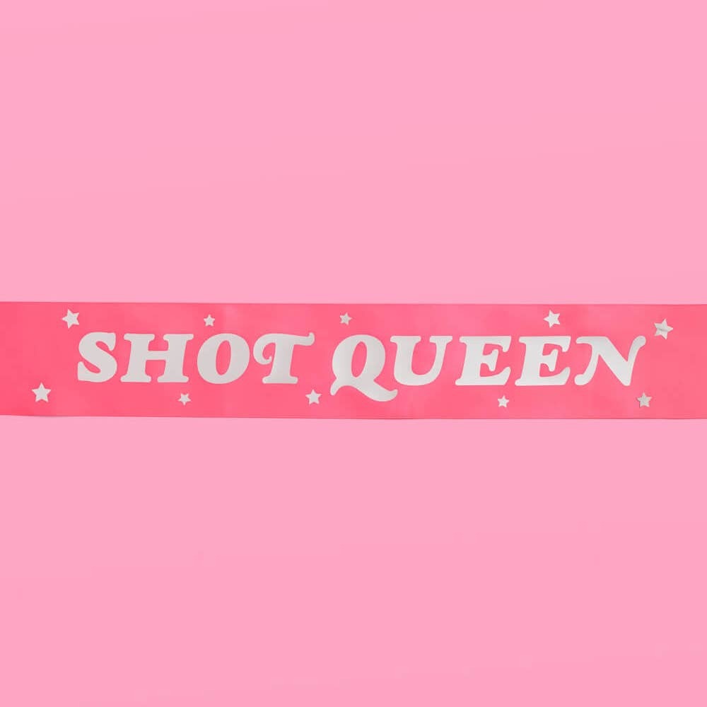 Pink shot queen sash with white stars for bachelorette party from Parte Haus party supply store in Bethesda MD