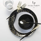 Black and gold dinnerware set modern geometric design celebration theme from Parte Haus party supply store in Bethesda Maryland