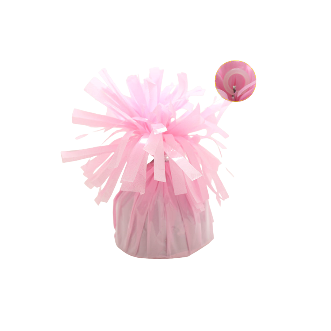 Baby pink foil wrapped balloon weight with shiny fringe great for birthdays from Parte Haus party supply store in Bethesda MD