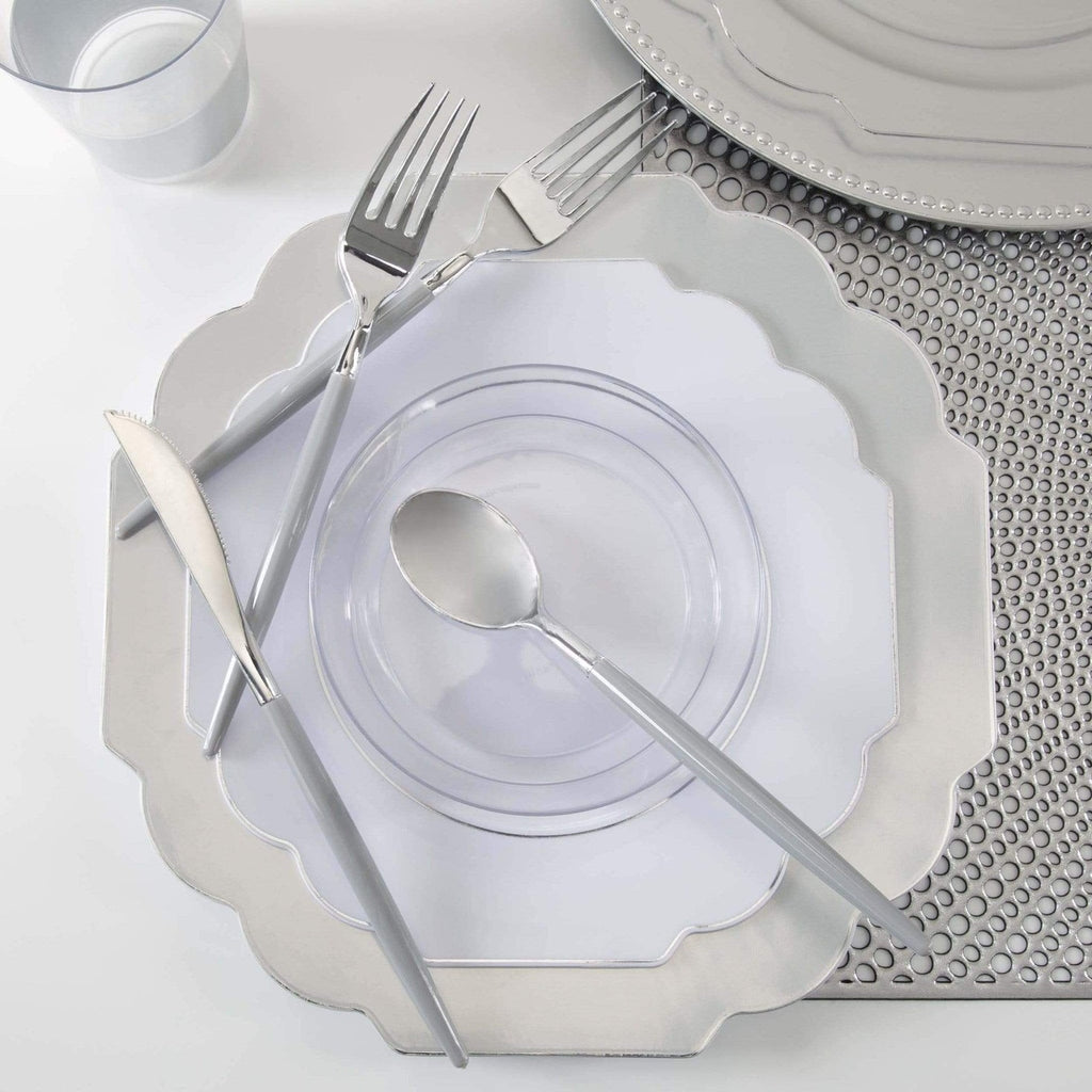 Silver dinnerware set with clear plates and modern cutlery elegant table setting from Parte Haus party supply store in Bethesda, Maryland