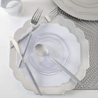 Silver dinnerware set with clear plates and modern cutlery elegant table setting from Parte Haus party supply store in Bethesda, Maryland