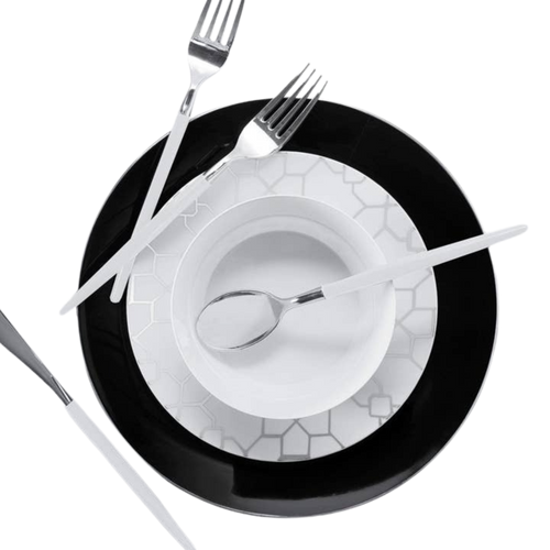 Black and white dinnerware set with geometric pattern and silver cutlery elegant table setting from Parte Haus party supply store in Bethesda Maryland