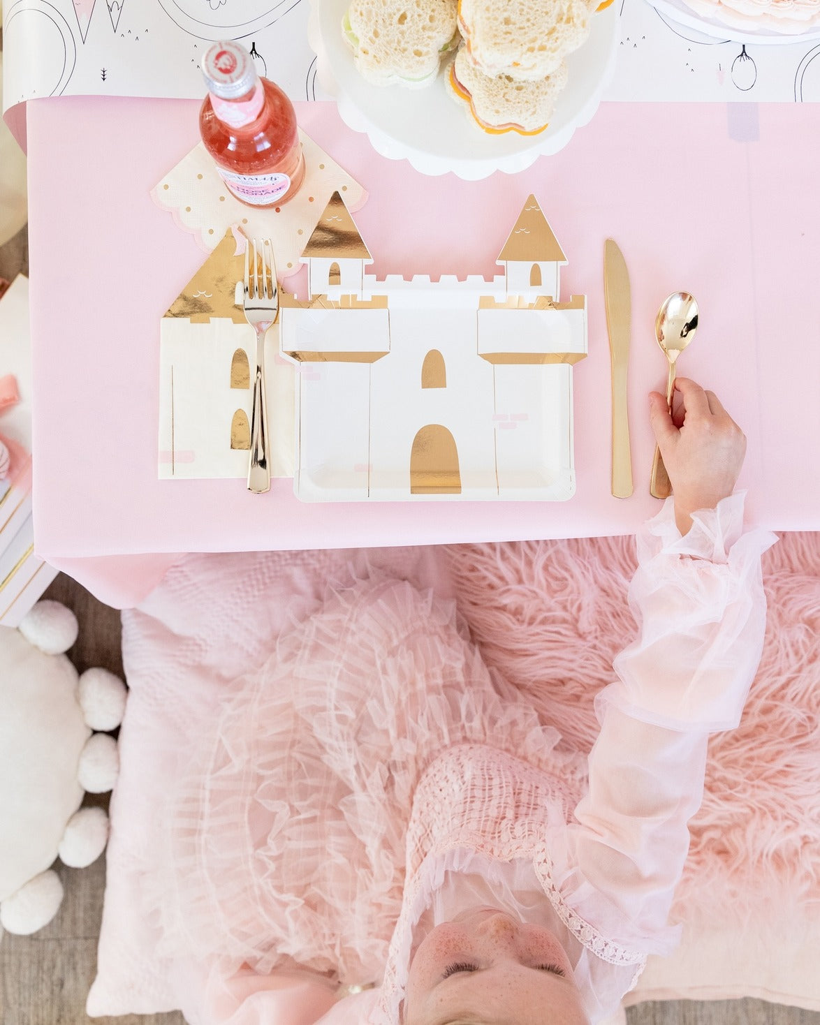Pink and gold castle plate princess birthday table setting from Parte Haus party supply store in Bethesda MD