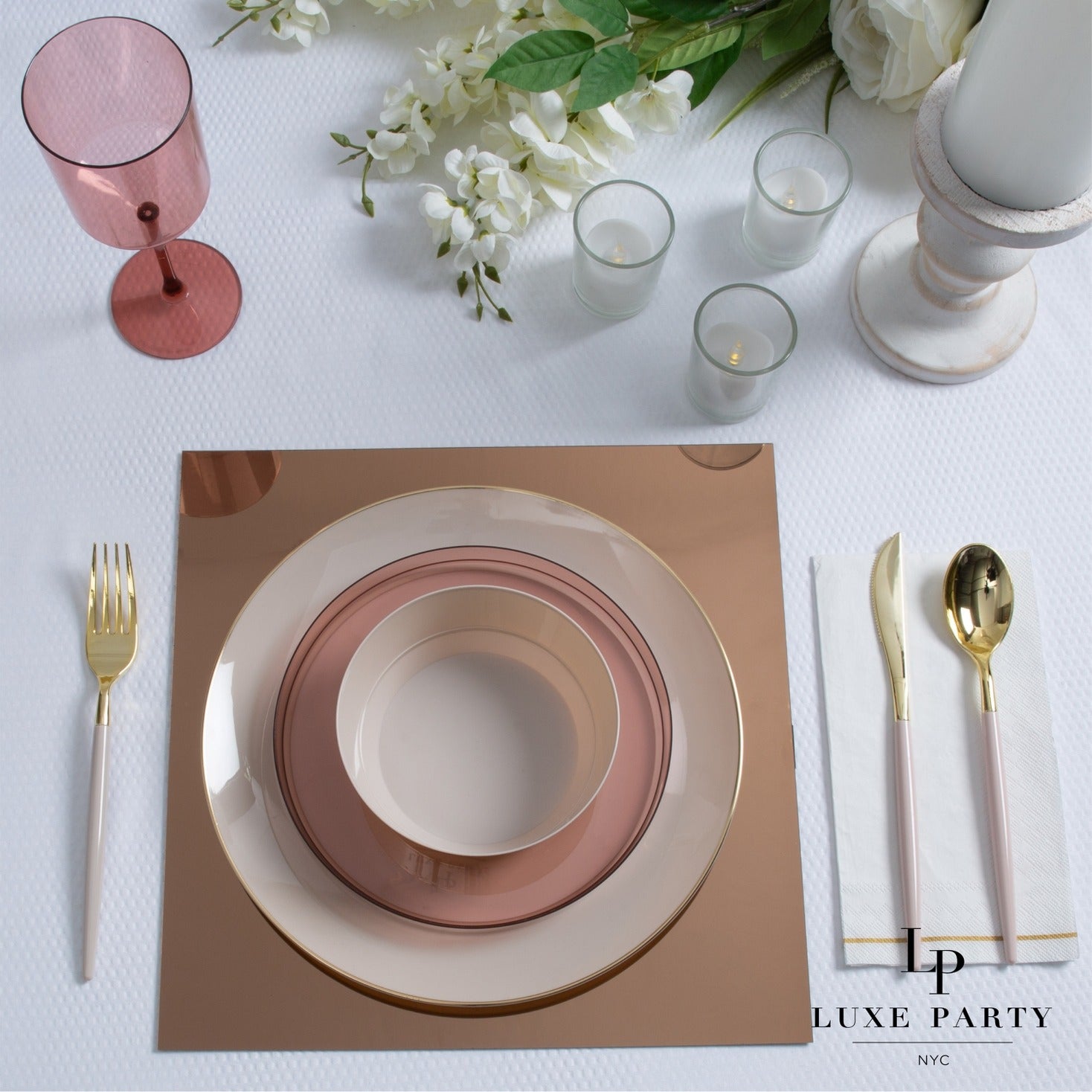 Rose gold tableware elegant plates and utensils for wedding dinner from Parte Haus party supply store in Bethesda Maryland