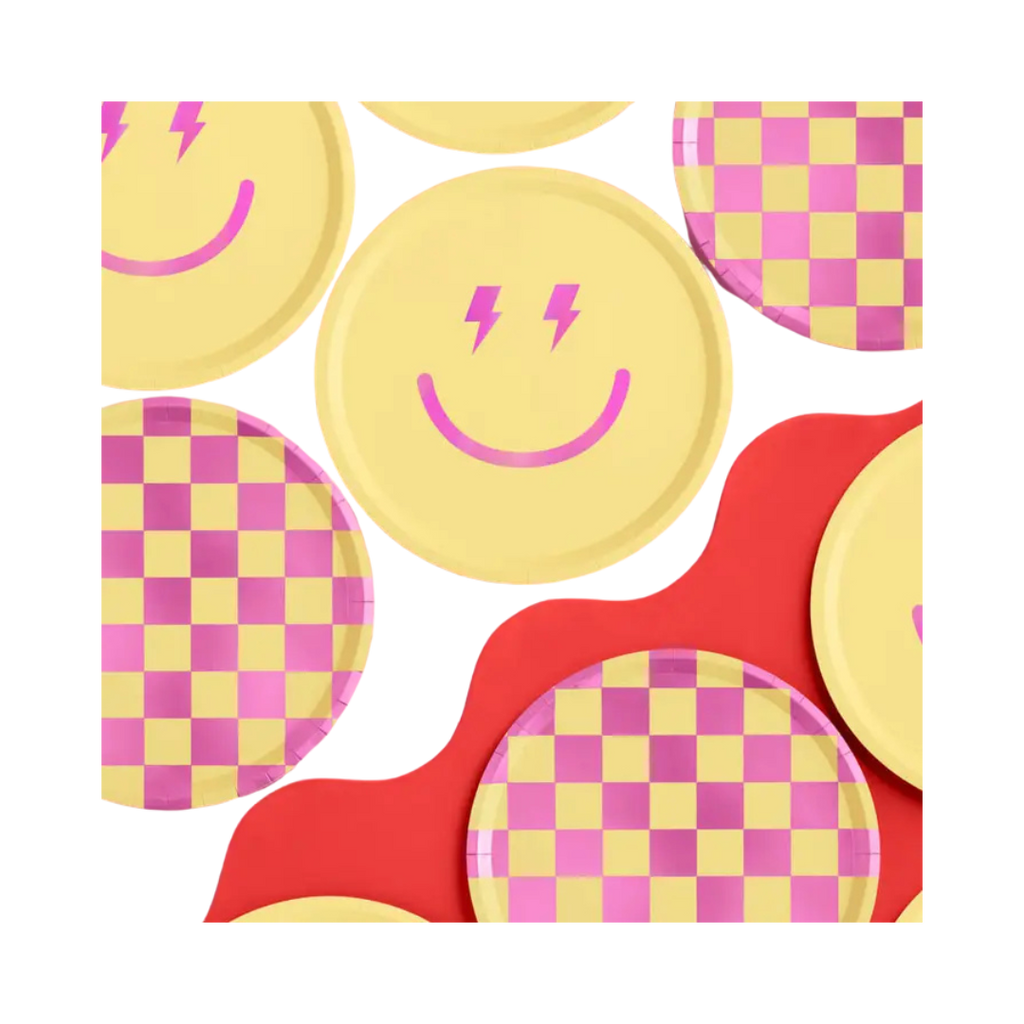 Yellow smiley face and checkered plates for birthday celebration from Parte Haus party supply store in Bethesda MD
