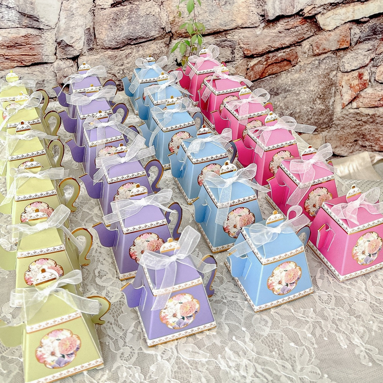 Pastel teapot favor boxes with bows for tea party theme from Parte Haus party supply store in Bethesda MD