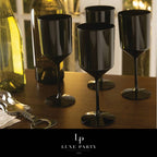 Black wine glasses modern table setting for dinner celebration from Parte Haus party supply store in Bethesda Maryland