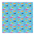 Blue baby shark wrapping paper with colorful cartoon sharks for kids birthday from Parte Haus party supply store in Bethesda MD