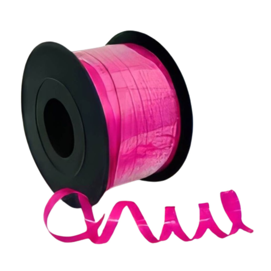 Pink curling ribbon spool for birthdays from Parte Haus party supply store in Bethesda MD