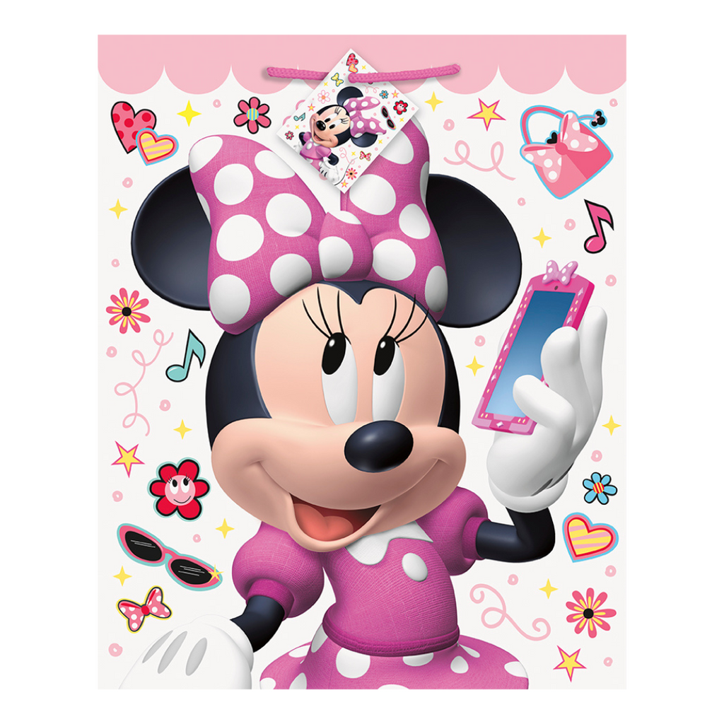 Pink Minnie Mouse gift bag with polka dots for birthday from Parte Haus party supply store in Bethesda MD