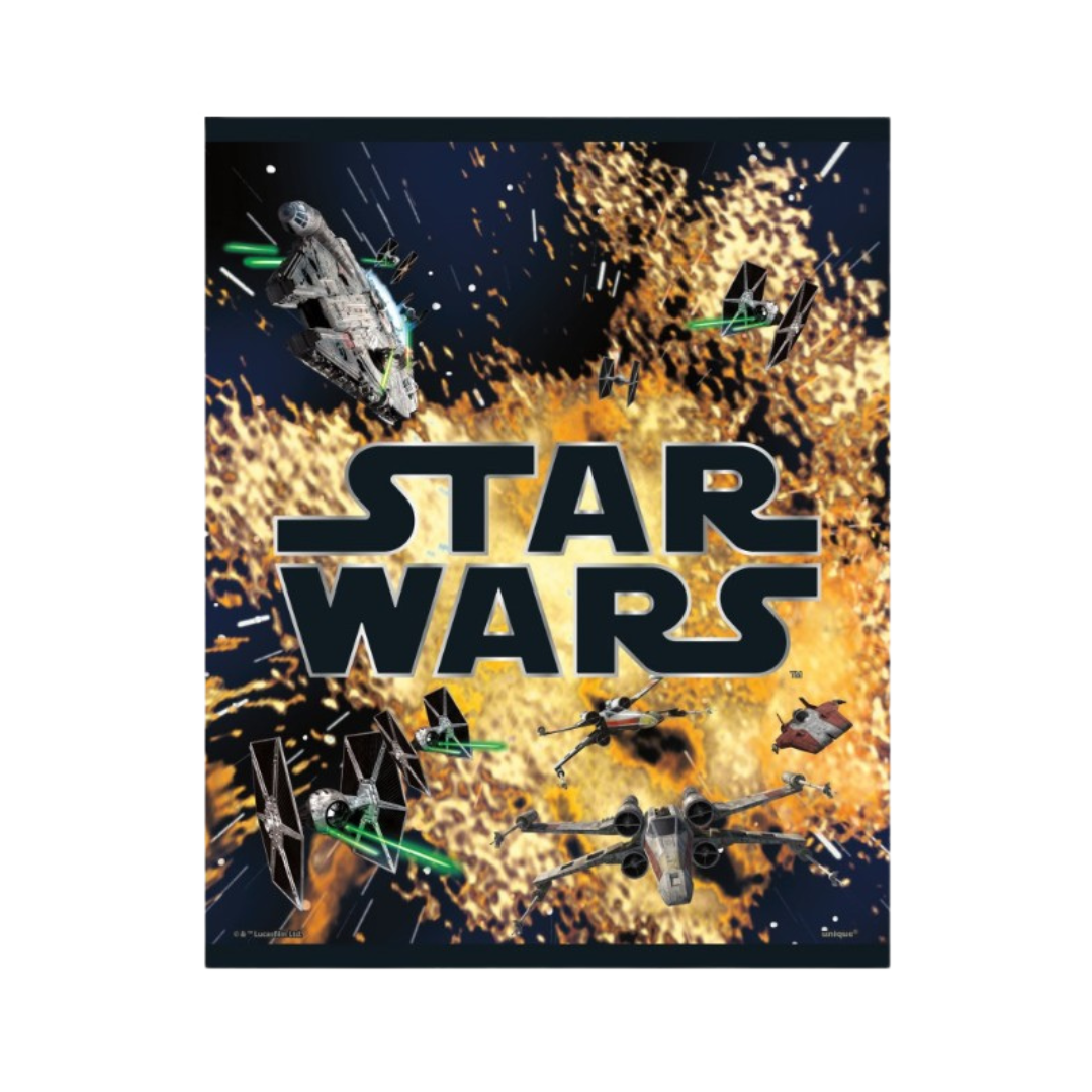 Black and yellow Star Wars plastic table cover with space battle scene birthday theme from Parte Haus party supply store in Bethesda Maryland