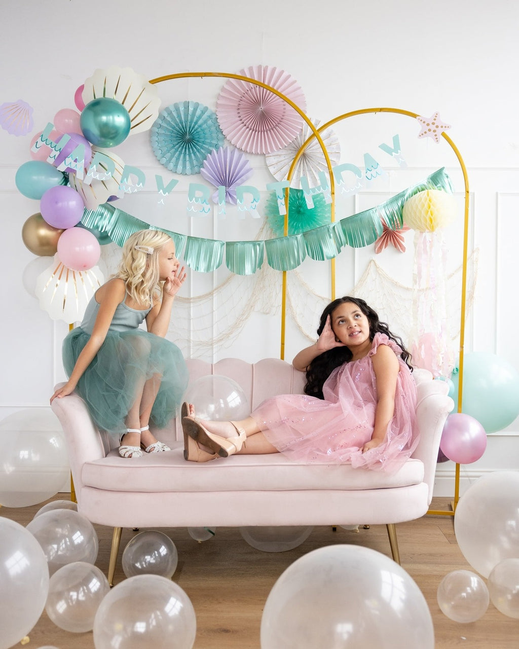 Pastel pink and teal birthday balloon set with happy birthday banner children theme from Parte Haus party supply store in Bethesda MD