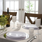 White modern plastic dinnerware set with silver placemats for elegant event from Parte Haus party supply store in Bethesda MD