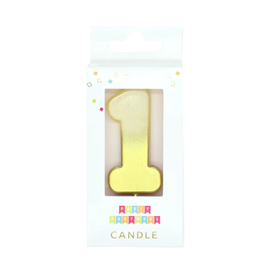 Gold number one birthday candle in a box from Parte Haus party supply store in Bethesda MD