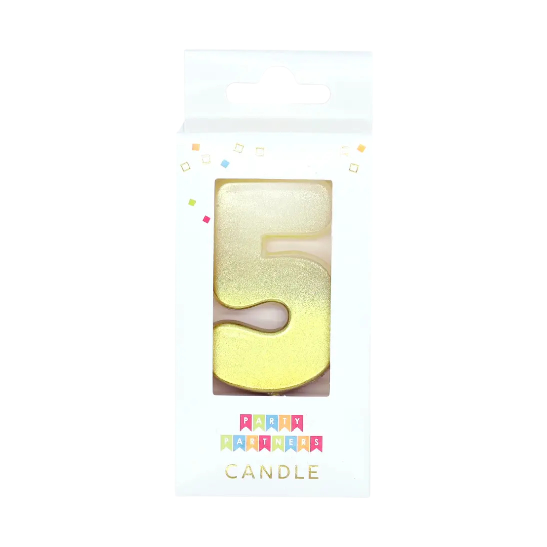 Gold number five birthday candle in white packaging for celebration from Parte Haus party supply store in Bethesda MD