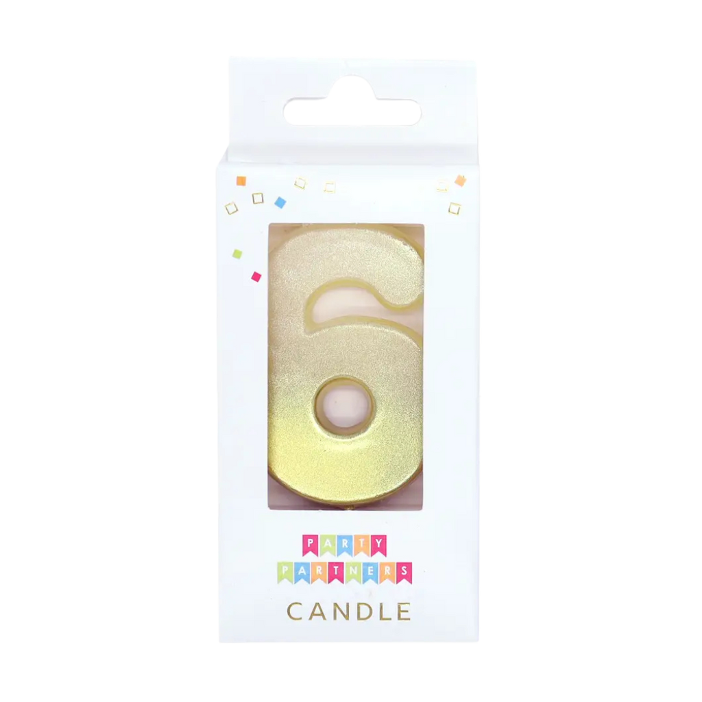Gold number 6 birthday candle in box for celebration from Parte Haus party supply store in Bethesda MD