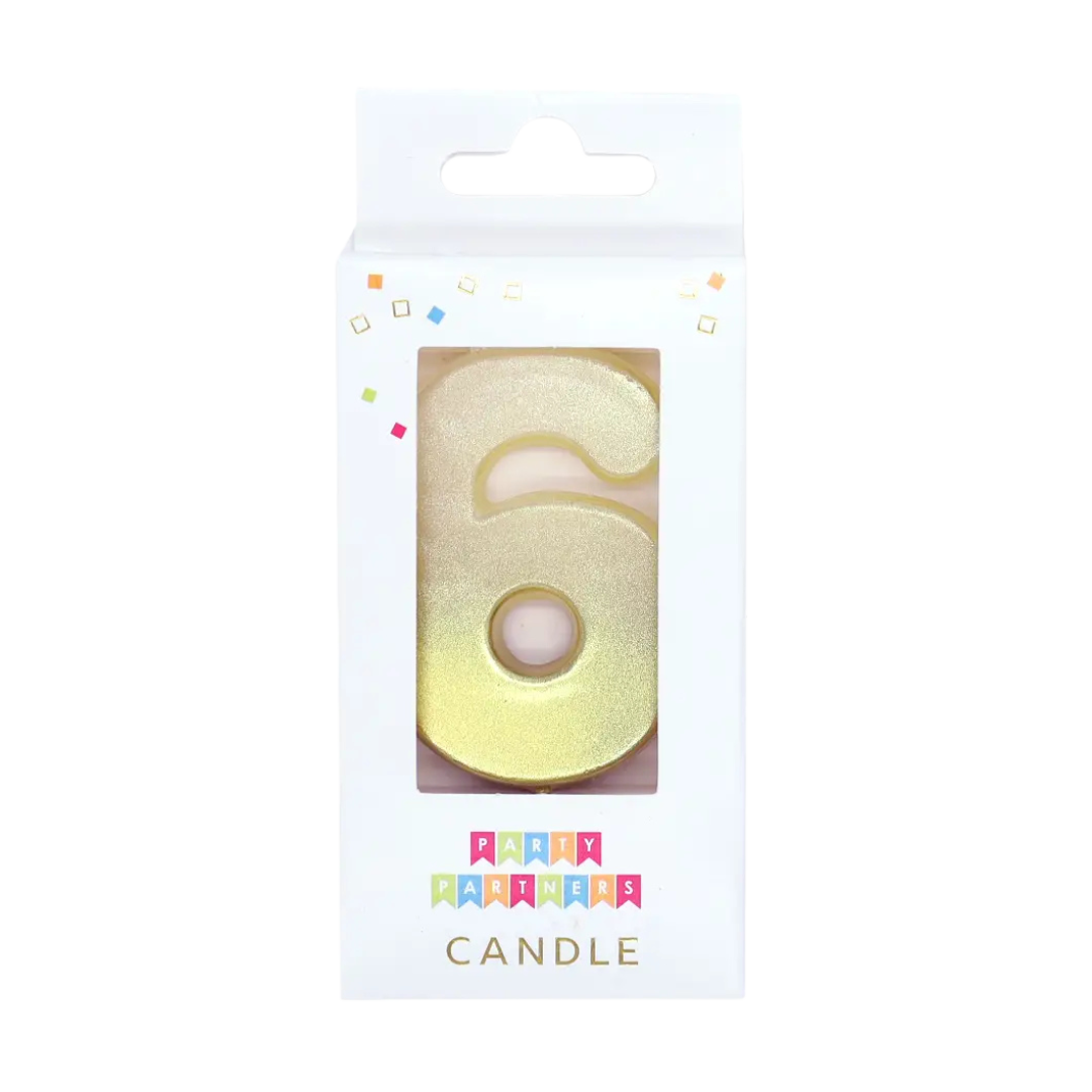 Gold number 6 birthday candle in box for celebration from Parte Haus party supply store in Bethesda MD
