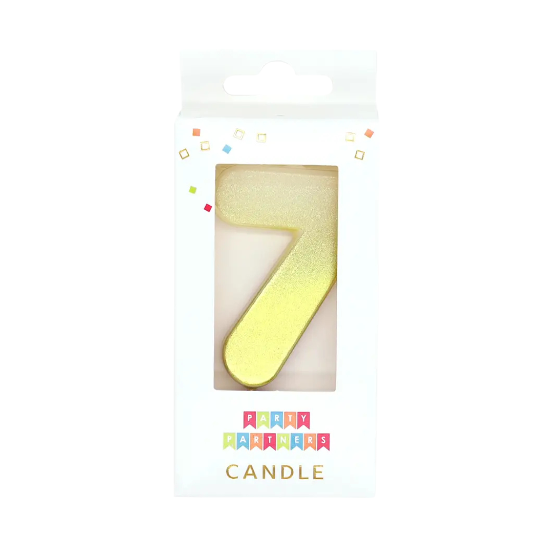 Gold number 7 candle in retail packaging birthday decor from Parte Haus party supply store in Bethesda MD