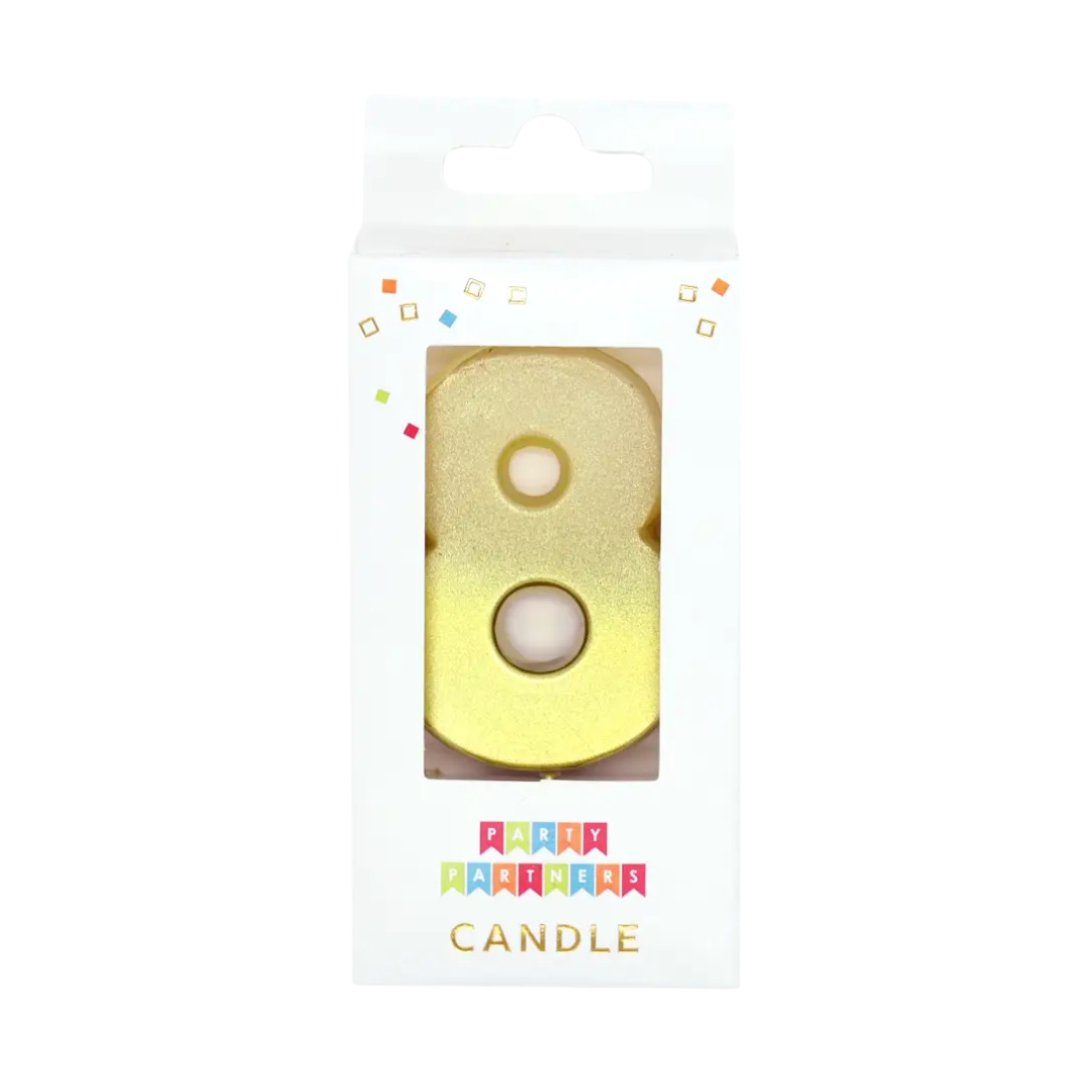 Gold number 8 candle in white packaging birthday decoration from Parte Haus party supply store in Bethesda MD