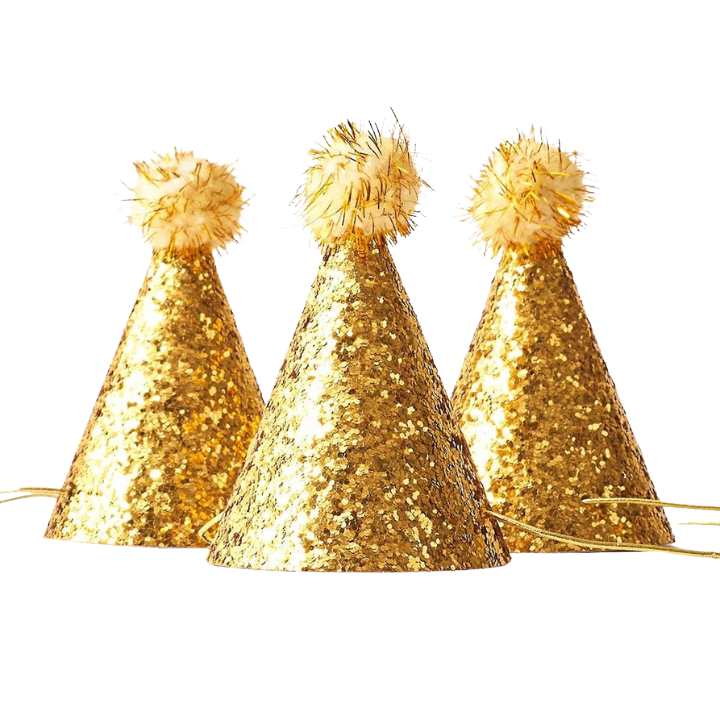 Gold glitter cone hats with fluffy tops birthday celebration from Parte Haus party supply store in Bethesda MD.