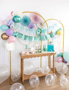 Pastel birthday decorations with balloons tableware and banner undersea theme from Parte Haus party supply store in Bethesda MD