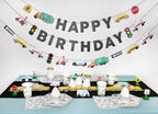 Colorful transportation birthday tableware with cars trucks and street sign decorations birthday theme from Parte Haus party supply store in Bethesda Maryland