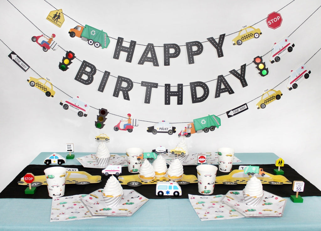 Colorful transportation birthday decorations banner tableware for kids from Parte Haus party supply store in Bethesda Maryland
