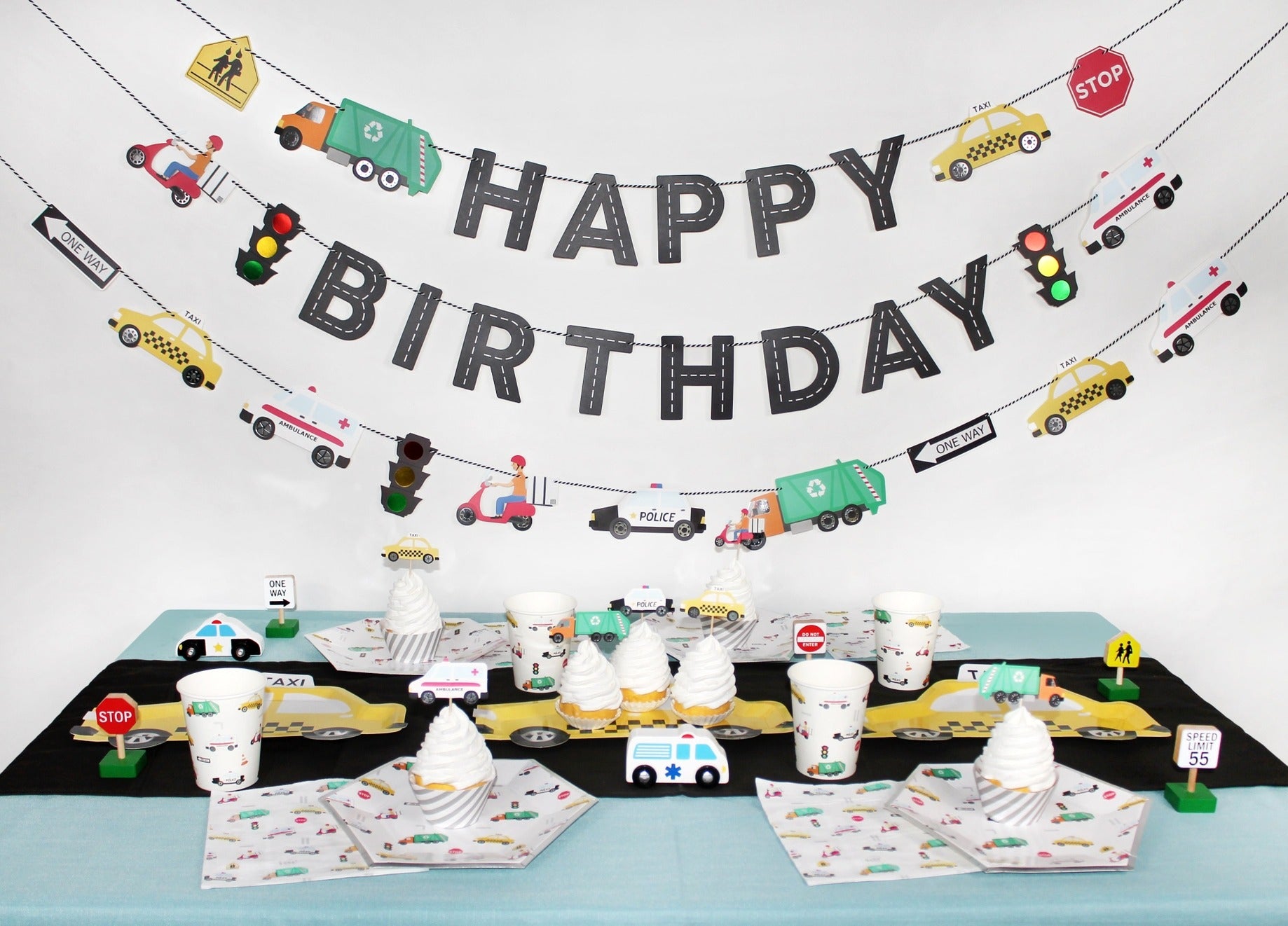 Multicolor transportation themed birthday tableware and decorations kids birthday from Parte Haus party supply store in Bethesda MD