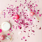 Pink and white confetti with candy and cookie celebration decor for birthday from Parte Haus party supply store in Bethesda MD
