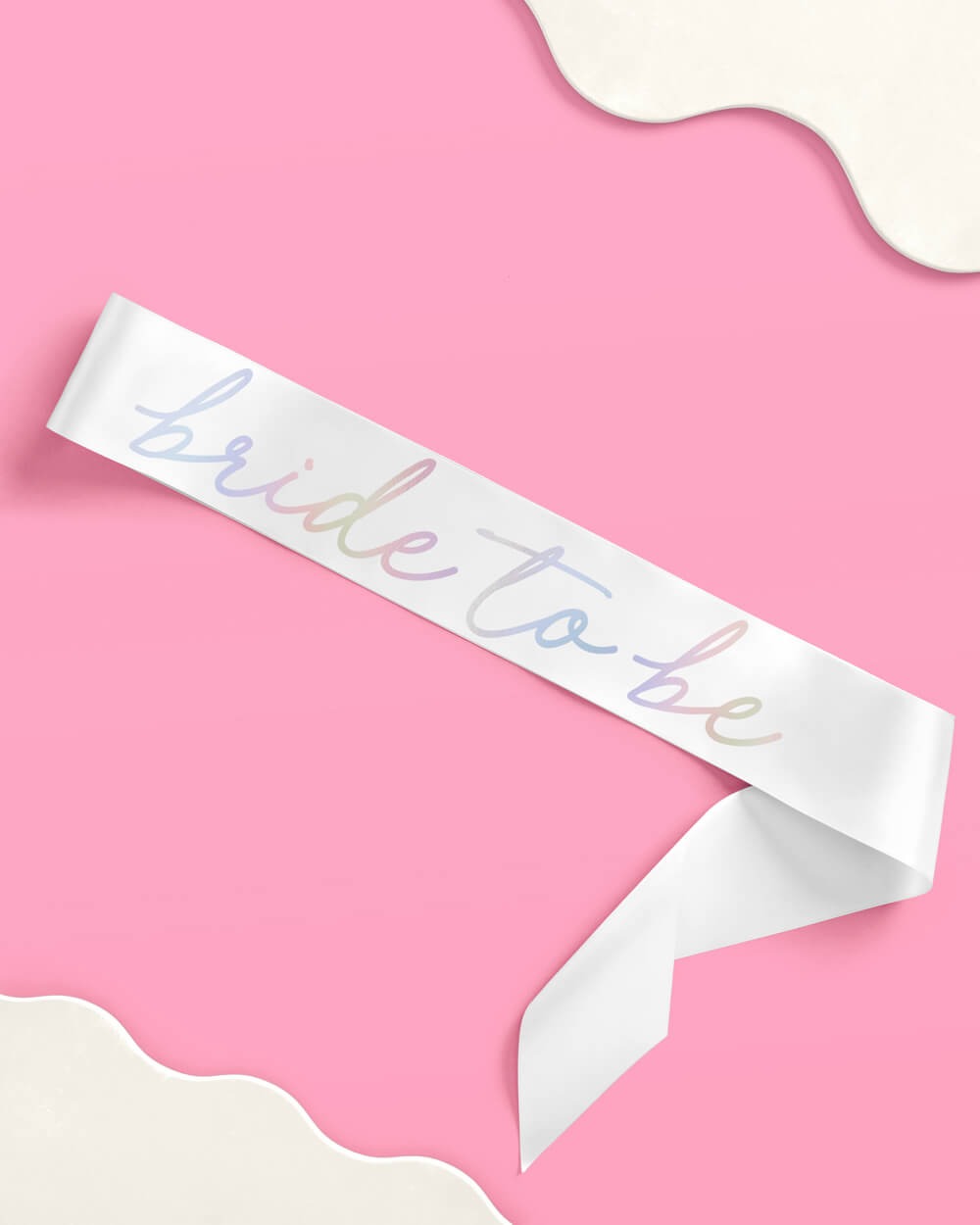 White bride to be sash with pastel lettering for bridal shower from Parte Haus party supply store in Bethesda Maryland