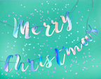 Iridescent banner Merry Christmas decoration for holiday theme from Parte Haus party supply store in Bethesda MD