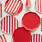 Red and white striped and solid plates and napkins carnival theme from Parte Haus party supply store in Bethesda MD