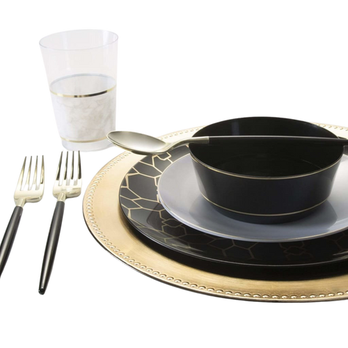 Black and gold dinnerware set elegant table setting for celebration from Parte Haus party supply store in Bethesda Maryland