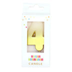 Gold number 4 candle in packaging for birthday from Parte Haus party supply store in Bethesda MD