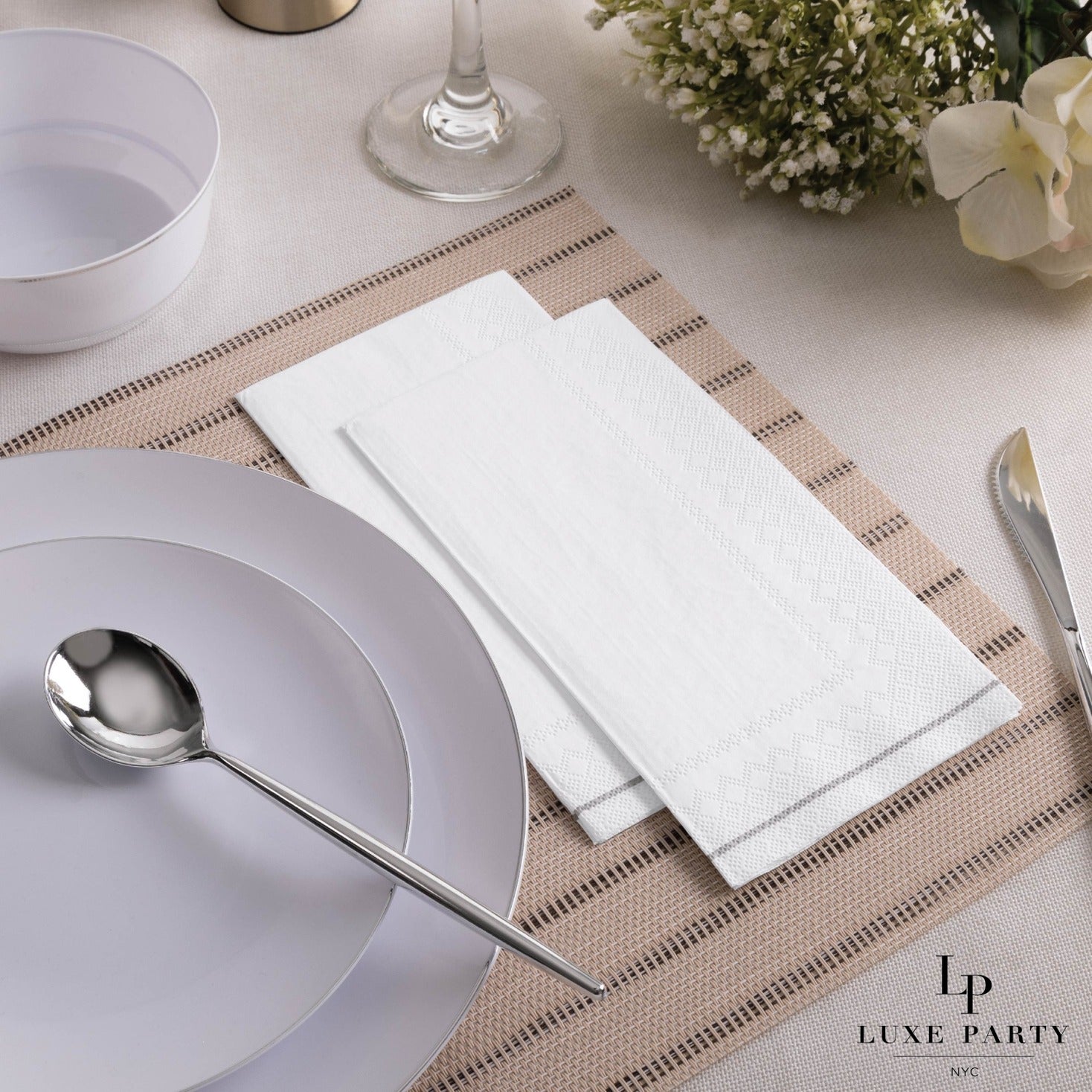 White napkins elegant table setting for dinner event from Parte Haus party supply store in Bethesda Maryland
