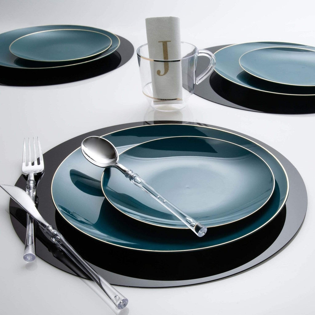 Blue and black dinnerware set with clear cutlery and monogram napkin table setting from Parte Haus party supply store in Bethesda Maryland