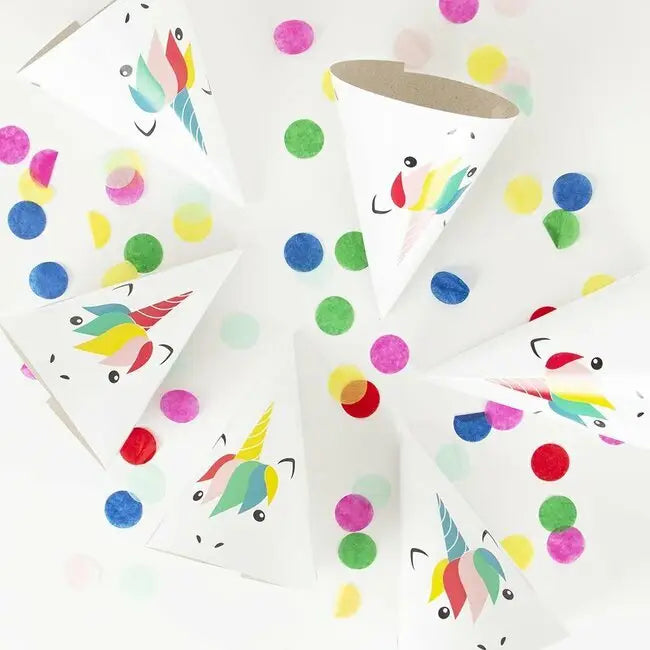 Rainbow unicorn hats with colorful confetti birthday theme from Parte Haus party supply store in Bethesda Maryland